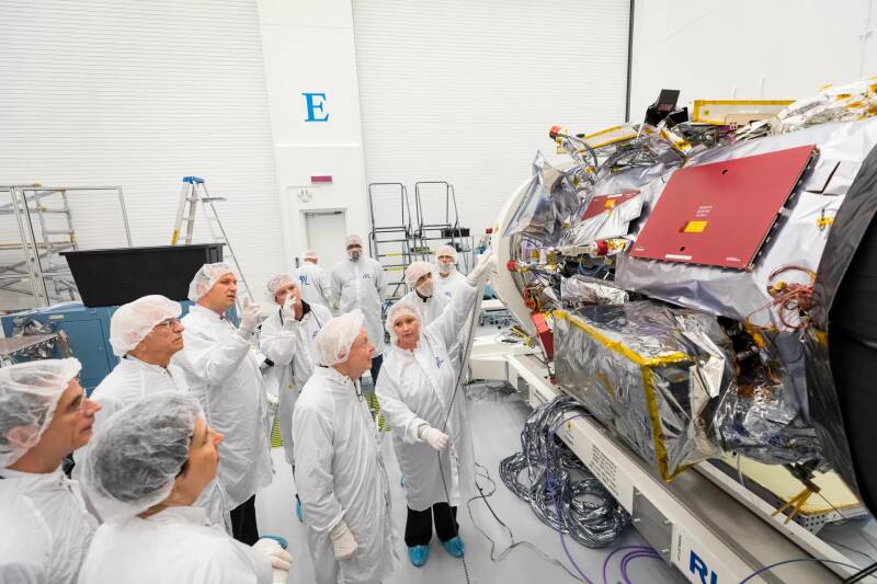 Color photo of Professor Gene Parker visiting the NASA Parker Solar Probe that is named after him at Johns Hopkins Applied Physics Laboratory in Laurel, Maryland.

Credit: NASA/Johns Hopkins APL/Ed Whitman.